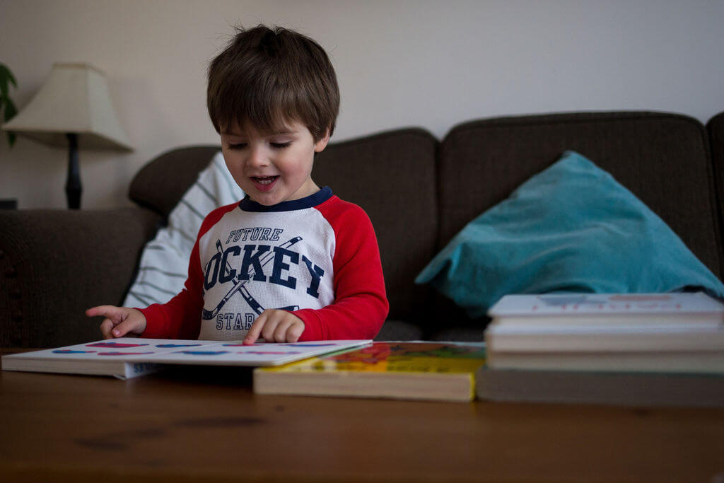 Boy reading a book