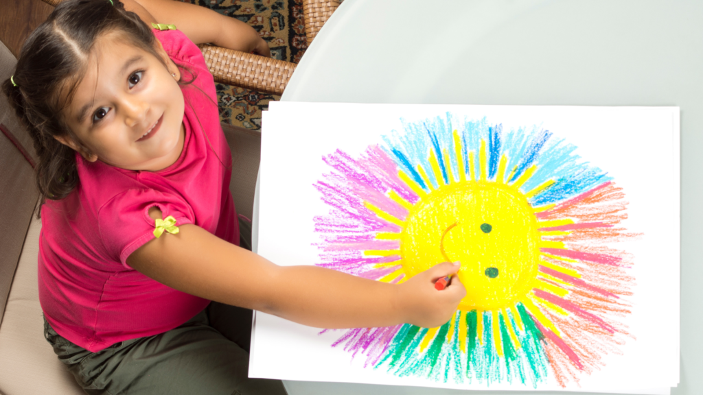 Preschooler drawing a photo