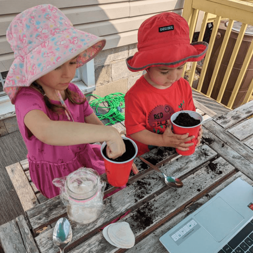 Child participating in an outdoor French vocabulary activity