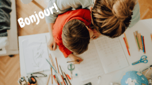 Parent and child learning French together at home using a play-based French homeschool curriculum