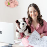 Madame Amy of 123 Petits Pas holding a learning puppet and printable activity sheets used in online French lessons for children.