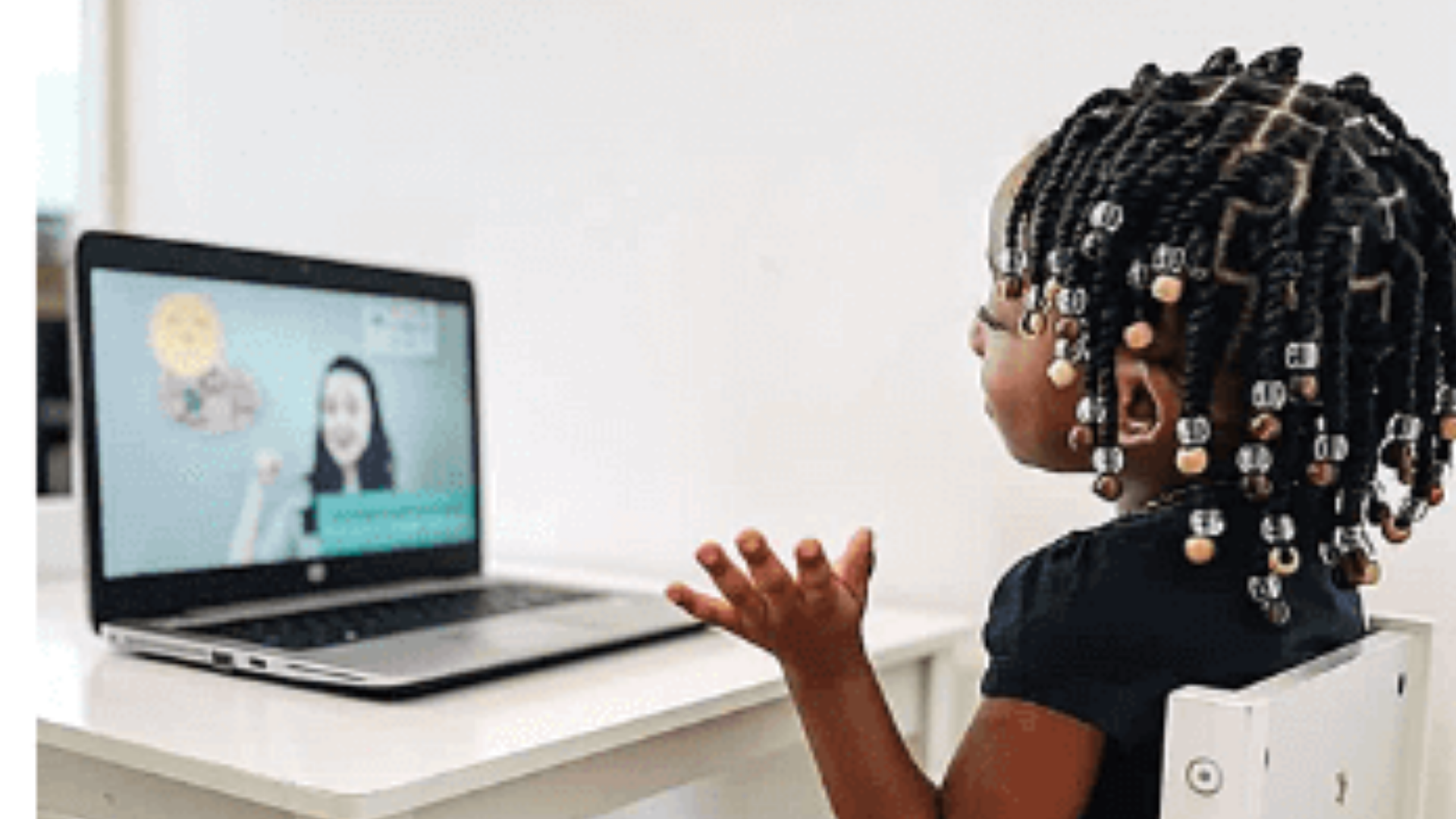 Child following a hands-on French learning activity at home